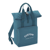 Cool Flo Custom Edition Roll-top Backpack in blue with silver custom embroidery and burgundy logo, front view.