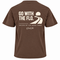 Back view of Cool Flo mocha t-shirt, featuring a cream graphic print that reads 'GO WITH THE FLO.' A winding road and dipping sun illustration sits above the phrase 'DRIVEN BY THE GOOD TIMES' and a central 'Cool Flo' logo.
