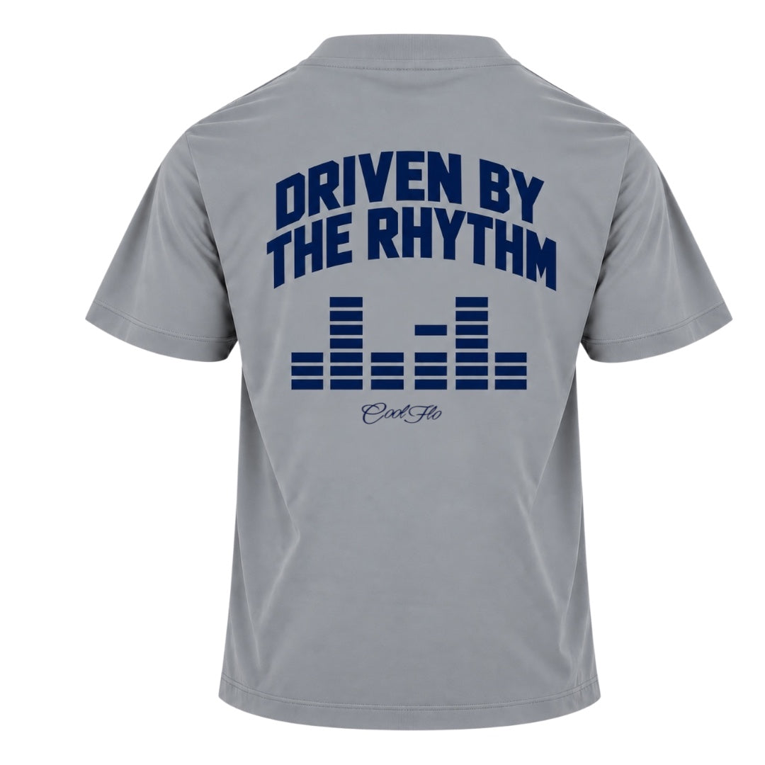 Back view of Cool Flo grey t-shirt with large text 'DRIVEN BY THE RHYTHM' with an equaliser graphic and Cool Flo script logo below, all printed in navy.