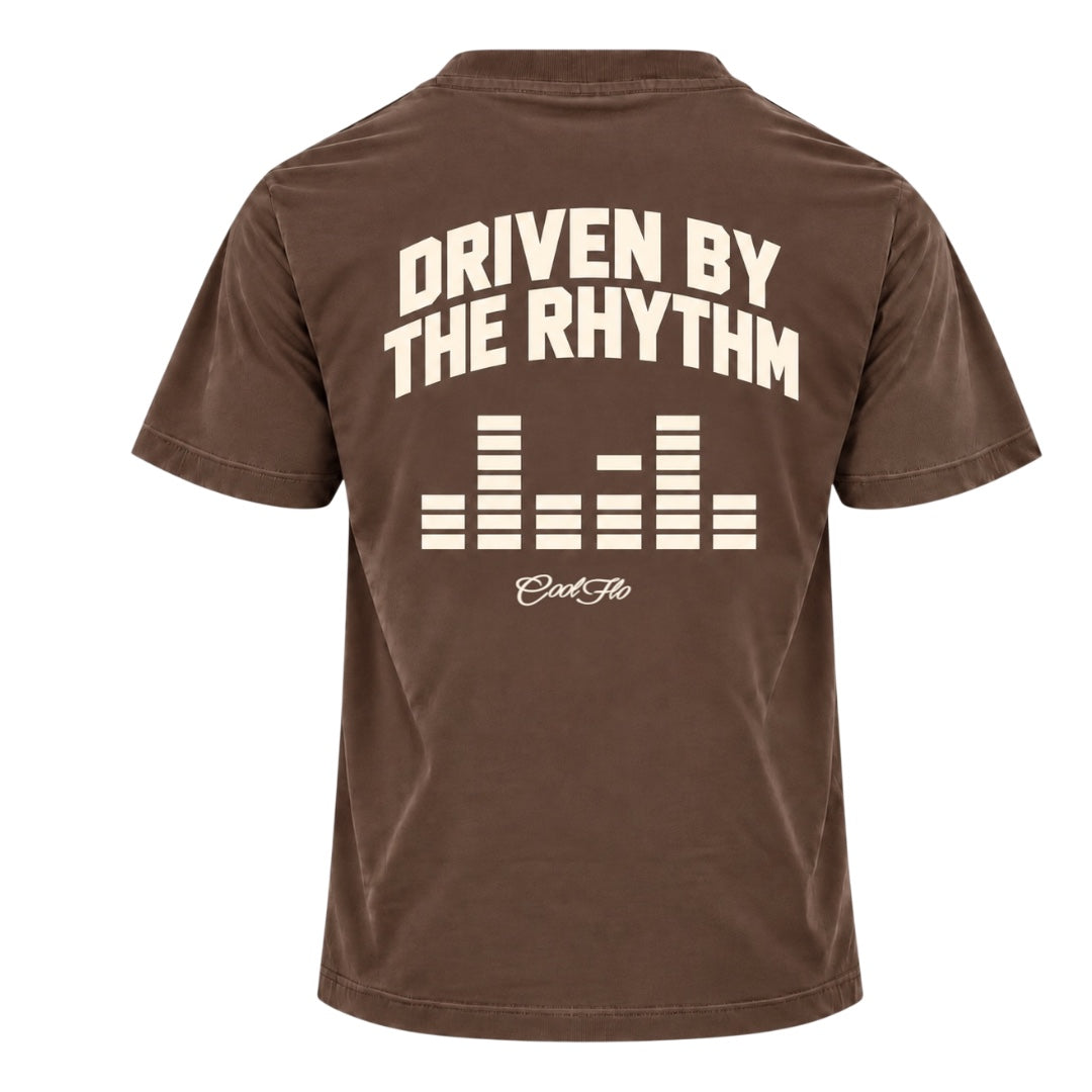 Back view of Cool Flo mocha t-shirt with large text 'DRIVEN BY THE RHYTHM' with an equaliser graphic and Cool Flo script logo below, all printed in cream.