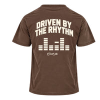Back view of Cool Flo mocha t-shirt with large text 'DRIVEN BY THE RHYTHM' with an equaliser graphic and Cool Flo script logo below, all printed in cream.