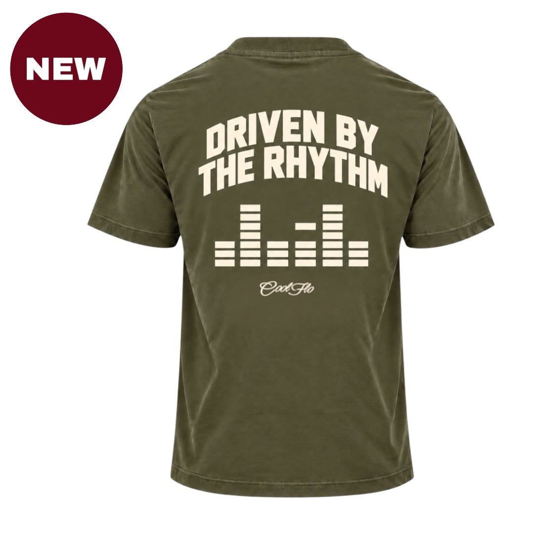 'NEW' Back view of Cool Flo Khaki t-shirt with large text 'DRIVEN BY THE RHYTHM' with an equaliser graphic and Cool Flo script logo below, all printed in cream.