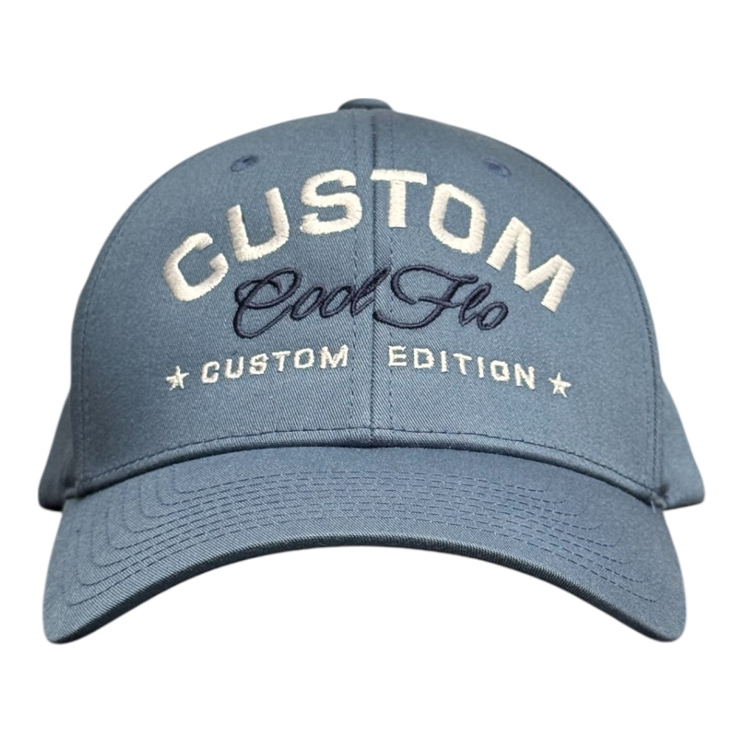 Cool Flo Custom Edition Delft Blue Baseball Cap with white custom embroidery and navy blue logo, front view.