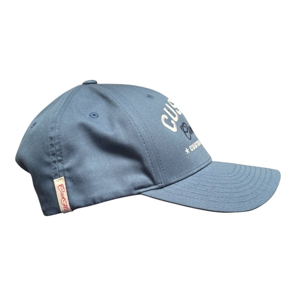 Cool Flo Custom Edition Delft Blue Baseball Cap with white custom embroidery and navy blue logo, side view.