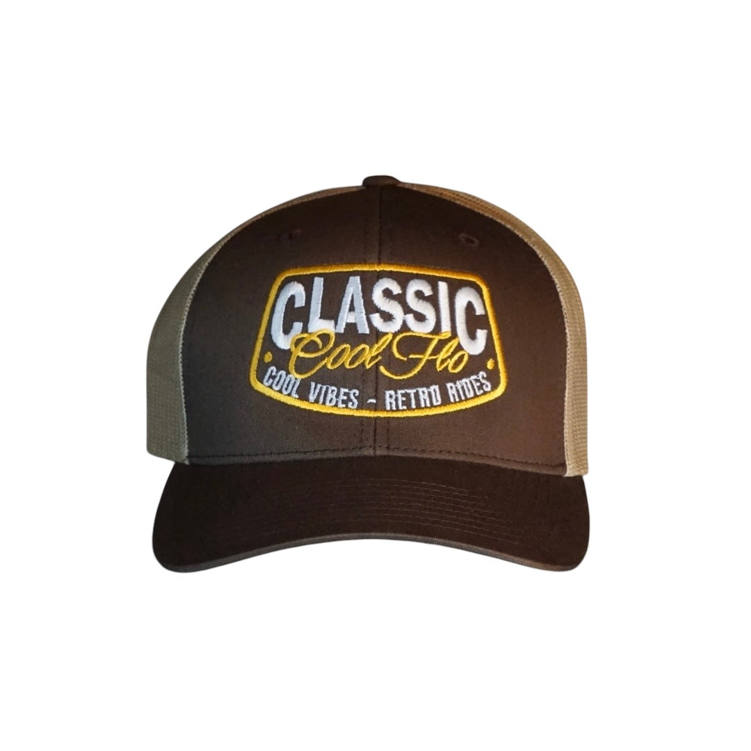 Cool Flo brown and khaki trucker cap with embroidered yellow and white 'Classic, cool vibes, retro rides' design.