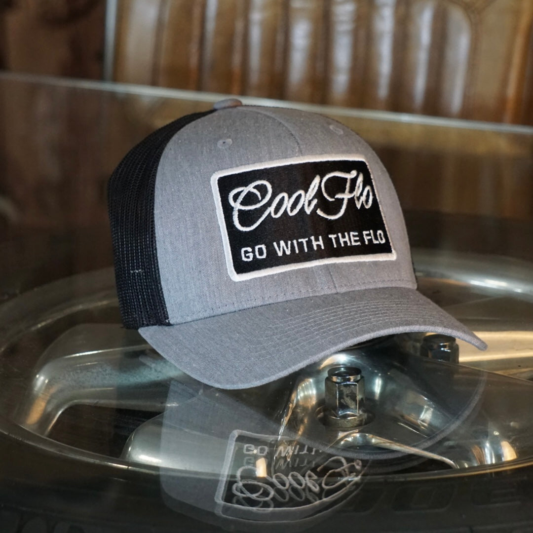 Go With The Flo Two-tone Trucker Cap - Cool Flo with black and white embroidery.