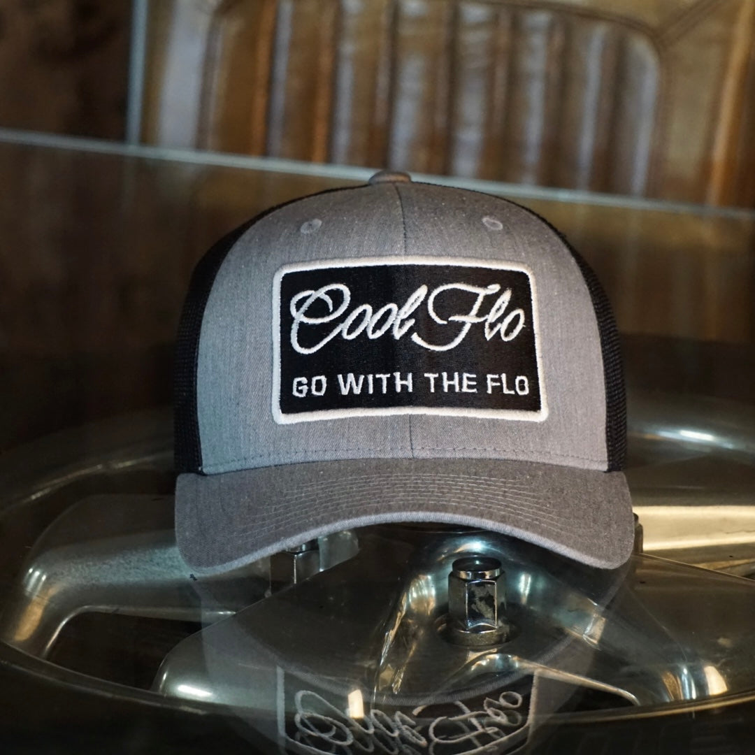 Go With The Flo Two-tone Trucker Cap - Cool Flo with black and white embroidery.