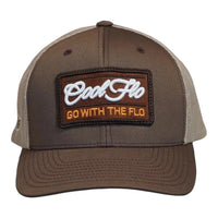 Front view of a Cool Flo Go With The Flo trucker cap in Brown/Khaki featuring an embroidered Go With The Flo badge and curved visor