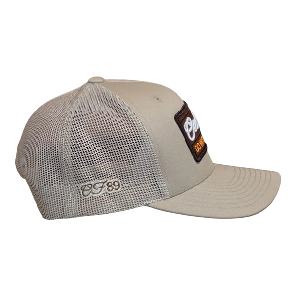 Right side view of a Cool Flo Khaki Go With The Flo trucker cap featuring CF89 embroidered side detail, breathable mesh back panels and adjustable snapback fastening