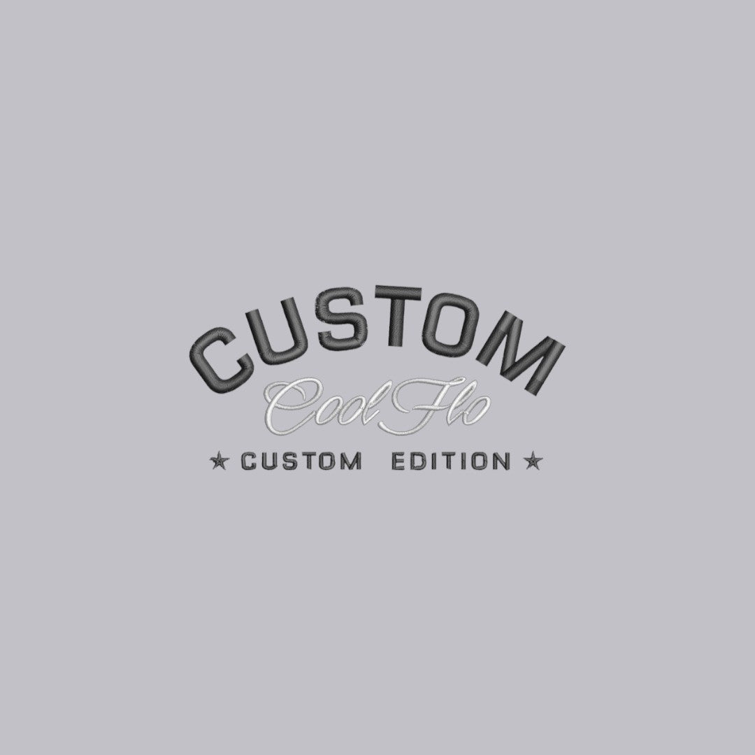 Close-up of Cool Flo Custom Edition Heather Grey base with black and silver-grey left-chest embroidery.