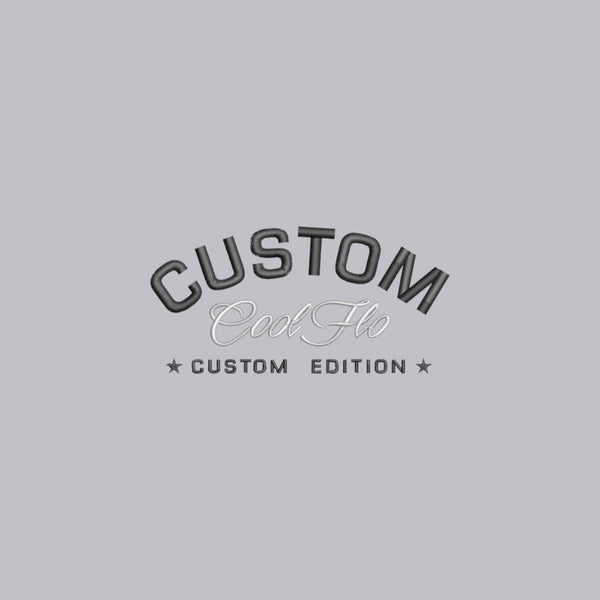Close-up of Cool Flo Custom Edition Heather Grey base with black and silver-grey left-chest embroidery.