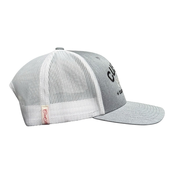 Cool Flo Custom Edition Heather Grey and White Trucker Cap with black custom embroidery and silver/grey logo,  side view.