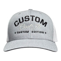 Cool Flo Custom Edition Heather Grey and White Trucker Cap with black custom embroidery and silver/grey logo, front view.
