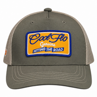 Front view of a Cool Flo Hitting The Road trucker cap in Olive/Khaki featuring an embroidered Hitting The Road badge in Orange, Blue and White and a curved visor.