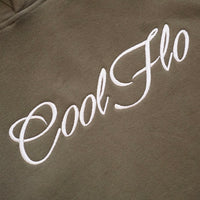 Close-up of khaki hoody with large embroidered 25cm logo in cream.