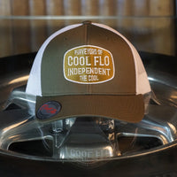 Cool Flo Independent khaki green and white trucker cap with embroidered badge design in complimentary colours.