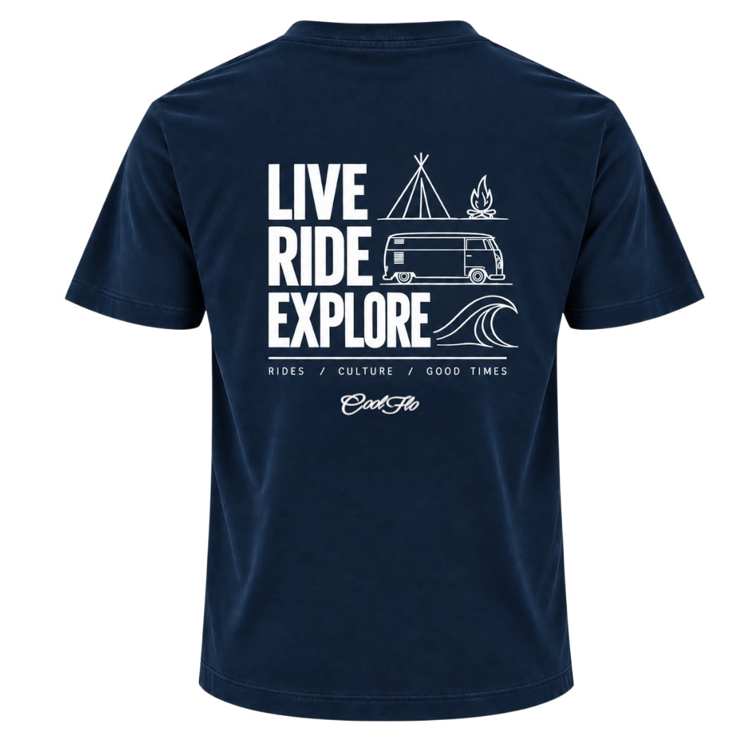 Back view of Cool Flo navy blue t-shirt, featuring a white graphic print with the text 'LIVE RIDE EXPLORE' and camping-themed illustrations including a VW van, tent, campfire, and wave. A strapline of Rides/Culture/Good Times and Cool Flo logo is printed below.