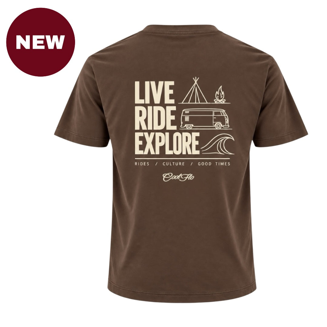 'NEW' Back view of Cool Flo Mocha t-shirt, featuring a cream graphic print with the text 'LIVE RIDE EXPLORE' and camping-themed illustrations including a VW van, tent, campfire, and wave. A strapline of Rides/Culture/Good Times and Cool Flo logo is printed below.