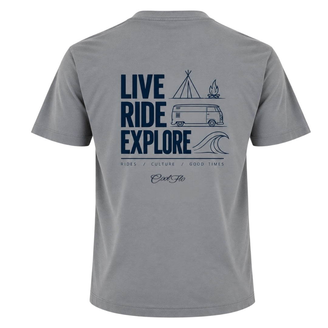 Back view of Cool Flo grey t-shirt, featuring a navy graphic print with the text 'LIVE RIDE EXPLORE' and camping-themed illustrations including a VW van, tent, campfire, and wave. A strapline of Rides/Culture/Good Times and Cool Flo logo is printed below.
