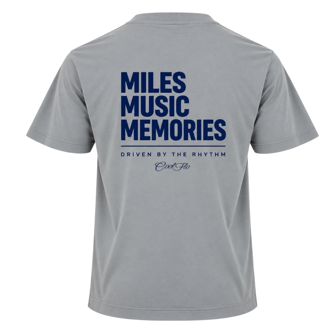  Back view of Cool Flo grey t-shirt, featuring a navy graphic print that reads 'MILES MUSIC MEMORIES.' with the strapline 'DRIVEN BY THE RHYTHM' and a central 'Cool Flo' logo below.