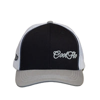 Front view of a Cool Flo Black/Grey/White trucker cap featuring an embroidered Mini Script logo positioned on the front left panel