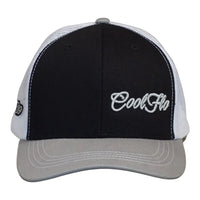 Front view of a Cool Flo Black/Grey/White trucker cap featuring an embroidered Mini Script logo positioned on the front left panel