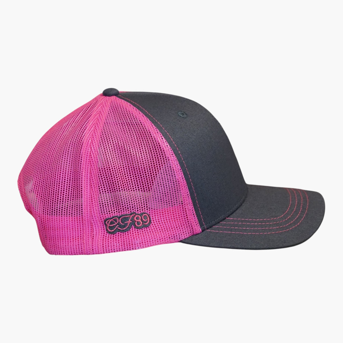 Side view of a Cool Flo Grey/Pink Trucker cap featuring CF89 embroidered side detail and breathable mesh back panels.