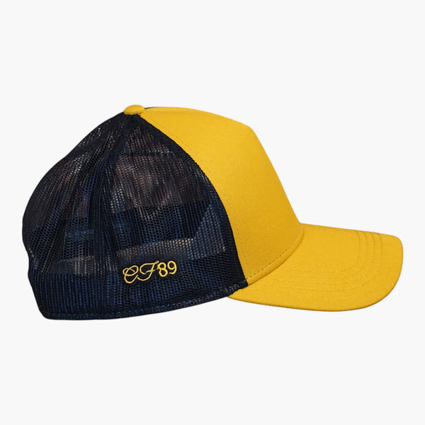 Side view of a Cool Flo Yellow/Black Trucker cap featuring CF89 embroidered side detail and breathable mesh back panels.