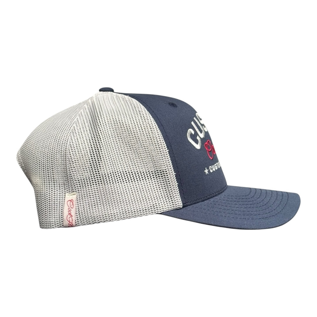 Cool Flo Custom Edition Navy and Silver Trucker Cap with silver custom embroidery and dark red logo, side view.