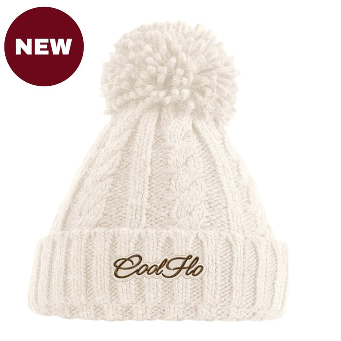 Cable knit bobble hat with script logo. Oatmeal.