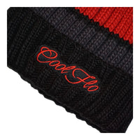 Chunky-knit bobble hat with script logo and large pom pom. Red and black.