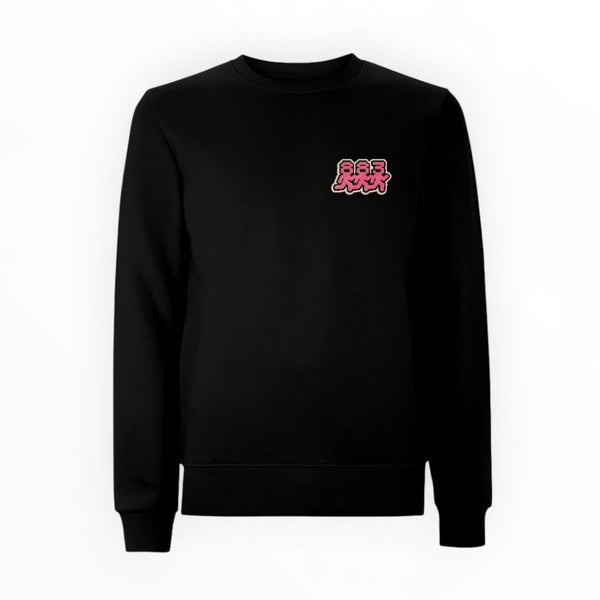 Centreforce Signal City black crewneck sweatshirt shown from the front, featuring a pink, black and white graphic print  on the left chest with a stylized '883' dancing people design.