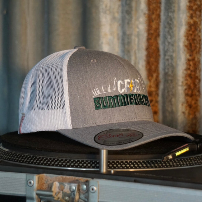 Centreforce Summer in the City event trucker cap (heather grey & white) placed on a record turntable 