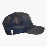 Side view of a Cool Flo Navy Surf Bus trucker cap featuring breathable mesh back panels, a Cool Flo loop tag and adjustable snapback fastening.