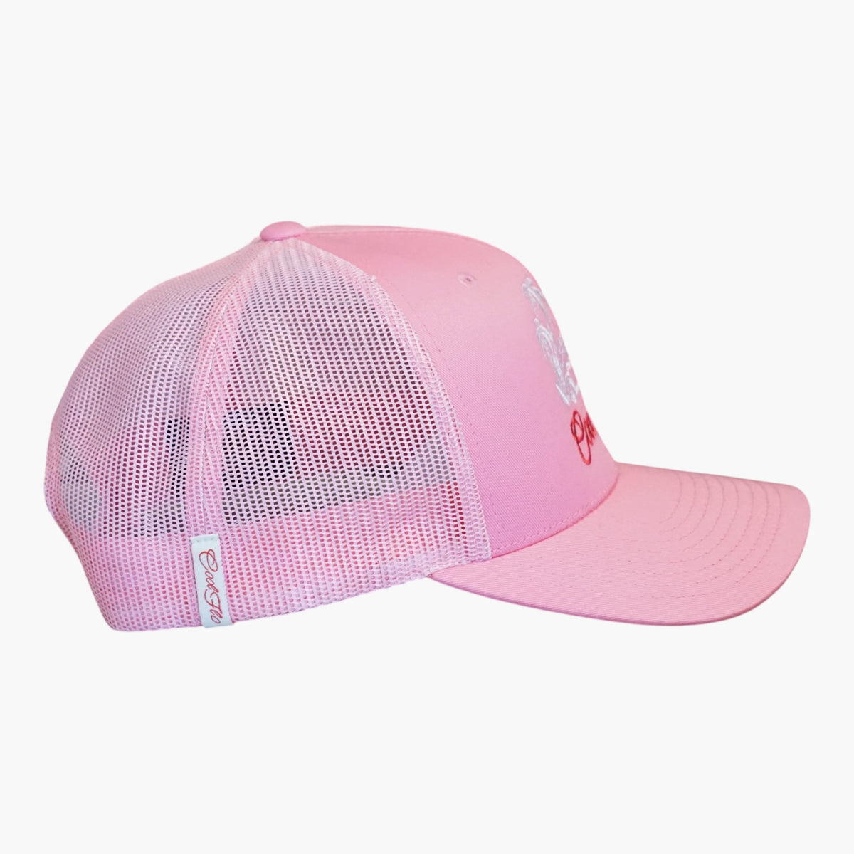 Side view of a Cool Flo Pink Surf Bus trucker cap featuring breathable mesh back panels, a Cool Flo loop tag and adjustable snapback fastening.