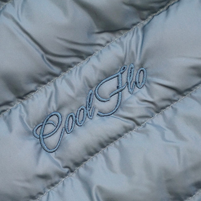 Close-up of embroidery on Teal premium gilet with matching Cool Flo script logo embroidered on the left.