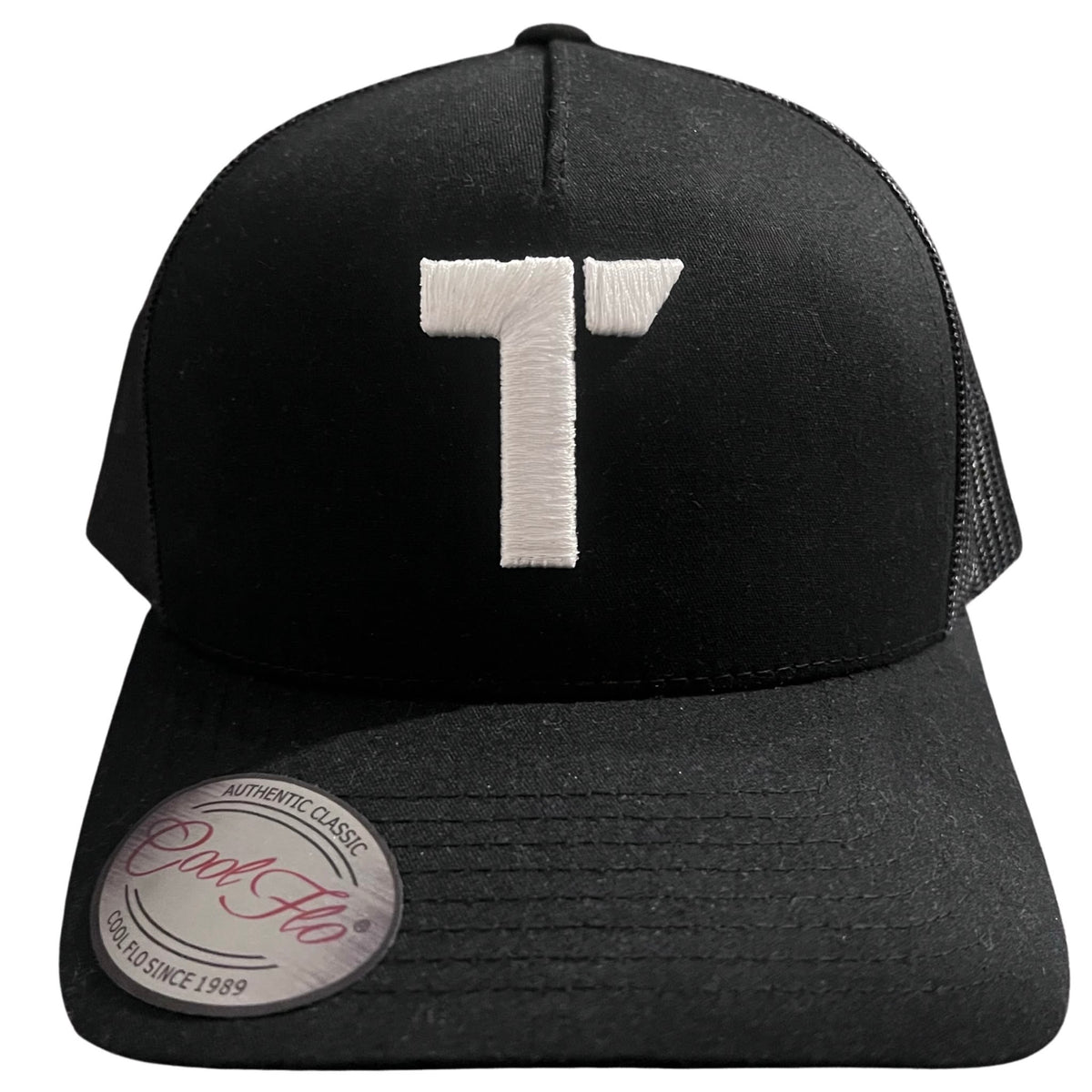 Black Tenacious trucker cap with embroidered white high-build/3D 'T' logo