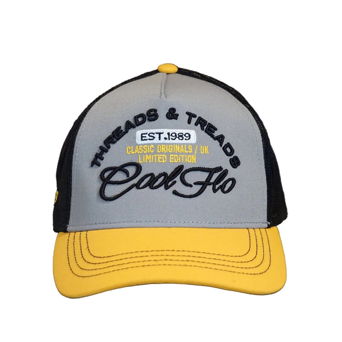 Front view of a Cool Flo Threads & Treads trucker cap in Yellow/Black/White featuring embroidered Threads & Treads artwork with a structured front panel and curved visor