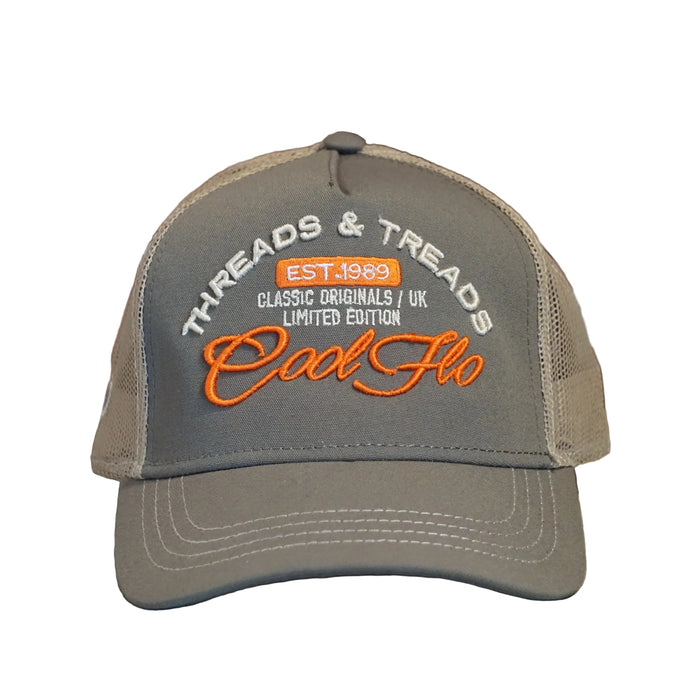 Front view of a Cool Flo Threads & Treads trucker cap in Olive/Khaki featuring embroidered Threads & Treads artwork with a structured front panel and curved visor