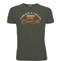 A khaki short-sleeve t-shirt with a Cool Flo Threads & Treads print in cream and orange.