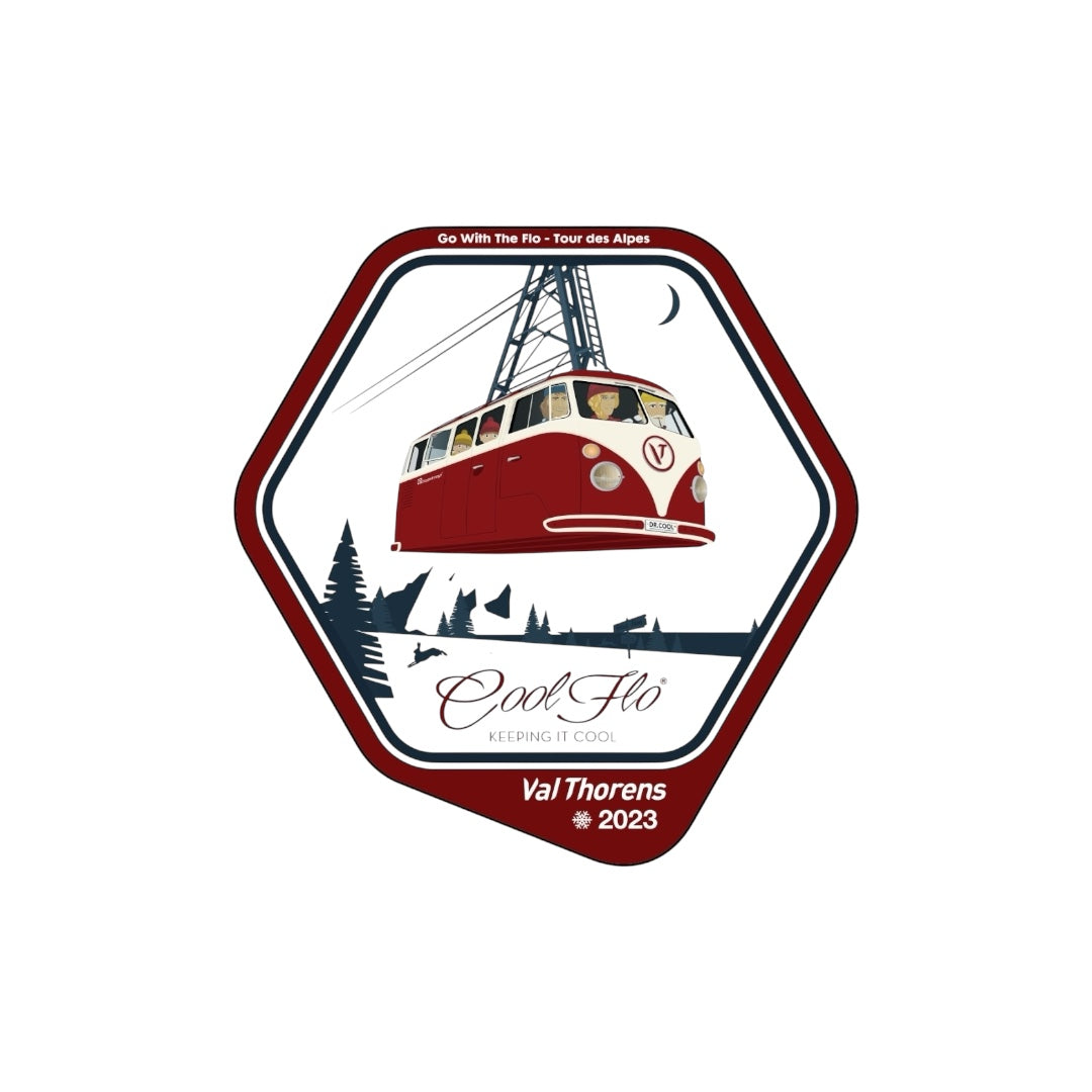 Cool Flo Winter Tour '23 - small sticker. Hexagonal design with a red and white VW cable car, trees, and mountains on a white background.