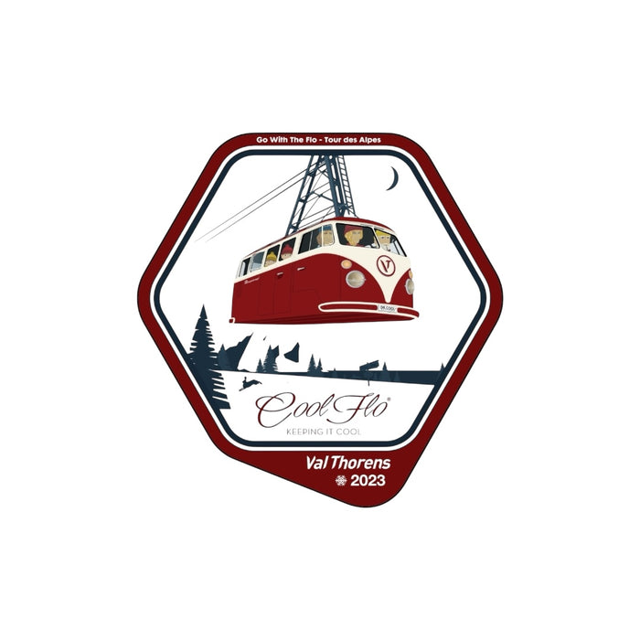 Cool Flo Winter Tour '23 - small sticker. Hexagonal design with a red and white VW cable car, trees, and mountains on a white background.