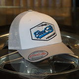 Cool Flo Vintage Classic Trucker Cap in silver-grey and white with an embroidered badge design with a retro feel. London - Cool Flo - Vintage Classic. 