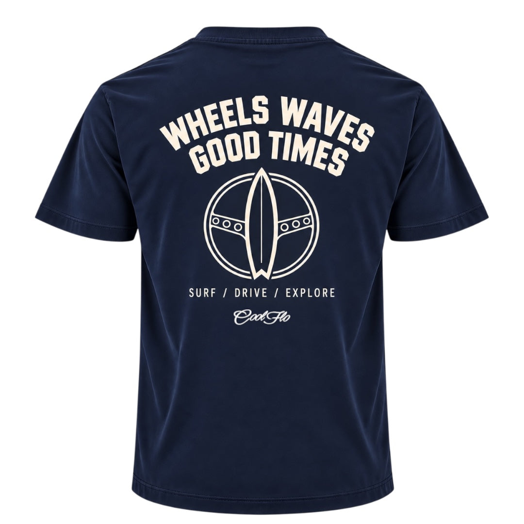 Back view of Cool Flo navy t-shirt with white print with the words 'WHEELS WAVES GOOD TIMES' a steering wheel/surfboard graphic and the text 'SURF/DRIVE/EXPLORE' and a Cool Flo logo below.