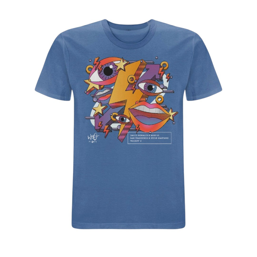 Blue Who Plays ‘Needin’ U’ T-shirt featuring colourful abstract artwork with illustrated eyes, lips, stars and lightning bolt graphics in purple, orange and yellow tones across the front chest.