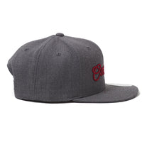 Dark grey snapback cap with red 3D embroidered Cool Flo script logo on the front.