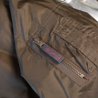 Cool Flo Collared Green Bomber Jacket - arm zip close-up